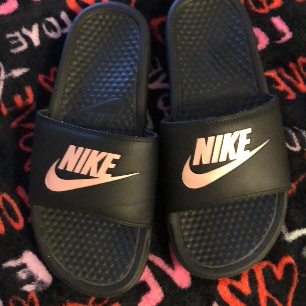 Rose gold and black nike slides